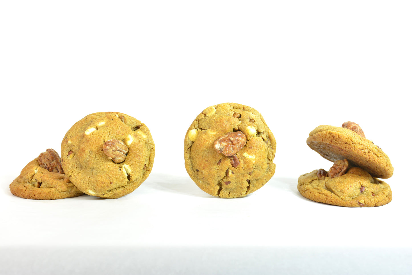 Pumpkin Spice Cookies. Enjoy the warm and comforting taste of pumpkin spice, paired with the satisfying crunch of buttery pecans and decadent white chocolate in our seasonal cookies.