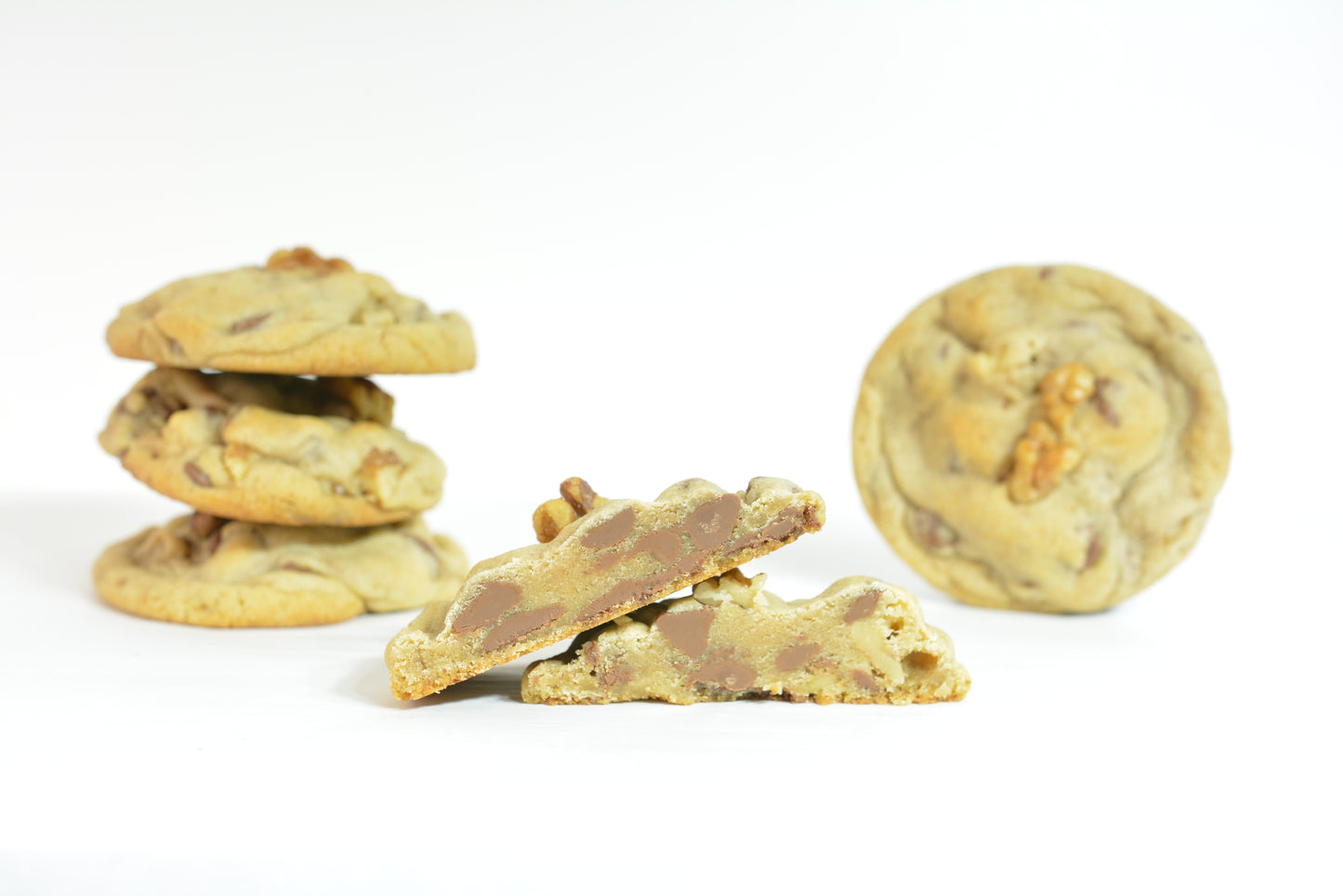 Milk Chocolate & Walnut Cookies. Savor the rich and velvety milk chocolate chips combined with crisp, flavorful walnuts in our milk chocolate & walnut cookies.