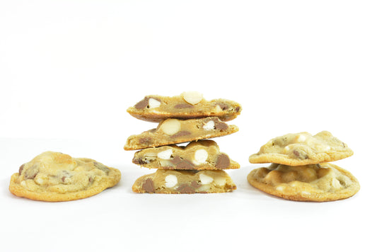 Milk Chocolate & Macadamia Nut Cookies. The ultimate indulgence cookie with luxurious milk chocolate, white chocolate, and macadamia nut makes for a truly irresistible cookie experience.